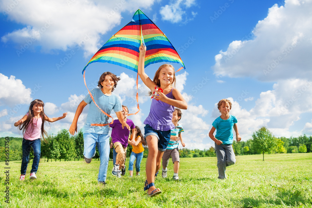 Many active kids with kite