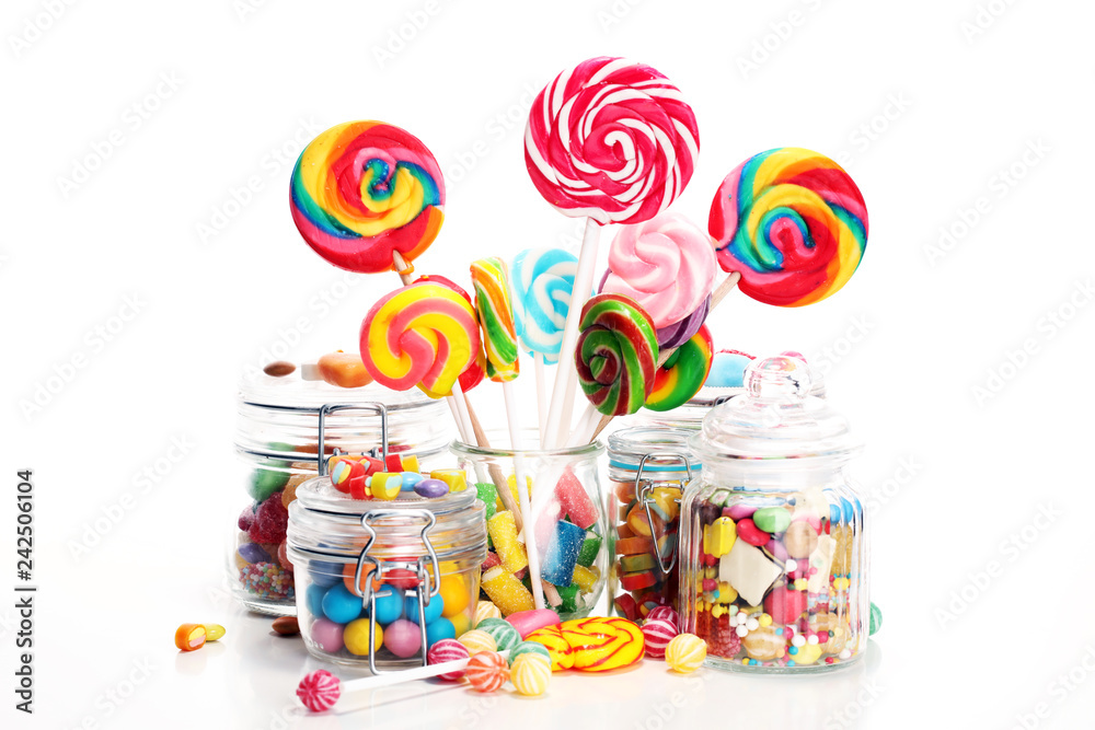 candies with jelly and sugar. colorful array of different childs sweets and treats.